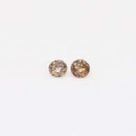 0.1 Total carat pair of round-cut champagne diamonds