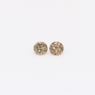 0.13 Total carat pair of round-cut champagne diamonds