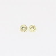 0.09 Total carat pair of round-cut yellow diamonds