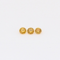 0.09 Total carat trio of round-cut fancy intense orange diamonds