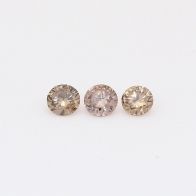0.27 Total carat trio of round-cut champagne diamonds