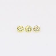 0.12 Total carat trio of round-cut fancy yellow diamonds