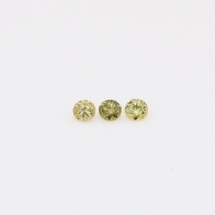 0.06 Total carat pair of round-cut fancy green diamonds