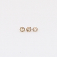 0.03 Total carat trio of champagne diamonds