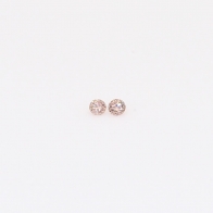 0.02 Total carat pair of round-cut Argyle intense pink champagne diamonds