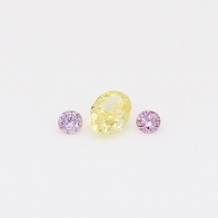 0.29 Total carat trio of round-cut purple and oval-cut fancy light yellow diamonds