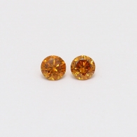 0.20 Total carat pair of orange diamonds