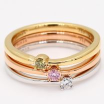 Egret green  white and Argyle pink diamond three ring stack