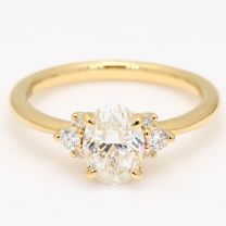 Deserie oval and round cut white diamond engagement ring