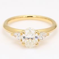 Cortina oval and pear cut white diamond 3 stone engagement ring