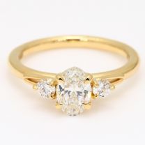 Francine oval and round-cut white diamond three-stone engagement ring