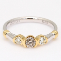 Eyre champagne and white diamond three stone ring