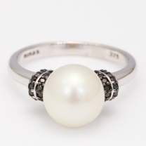 Alabaster white South Sea pearl and black diamond ring