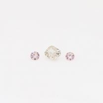 0.09 Total carat trio parcel of light orangy pink cushion cut and Argyle pink diamonds