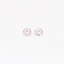 0.09 Total carat pair of round cut Argyle pink diamonds