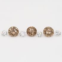 0.35 Total carat parcel of round cut white and champagne diamonds