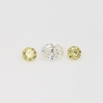 0.14 total carat trio of round and oval-cut white and yellow diamonds