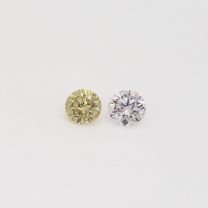 0.09 carat pair of round cut green and Argyle NCP pink diamonds