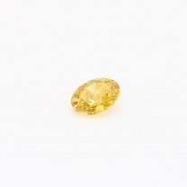 0.25 Carat oval cut yellow diamond
