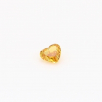 0.19 Carat heart cut orange yellow diamond