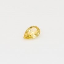 0.26 Carat pear cut yellow orange diamond