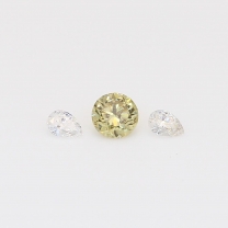 0.27 Total carat trio of pear-cut white and round-cut fancy green diamonds