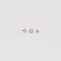 0.02 Total carat trio of round-cut rainbow coloured diamonds