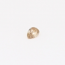 0.12 Carat pear-cut champagne diamond