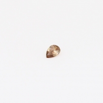 0.04 Carat pear-cut champagne diamond