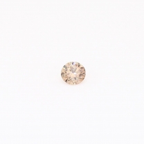 0.082 Carat round-cut champagne diamond