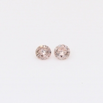 0.14 Total carat pair of round-cut intense pink champagne diamonds