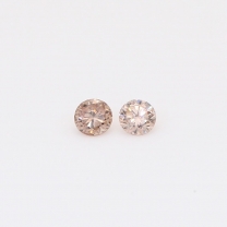 0.16 Total carat pair of round-cut intense pink champagne diamonds