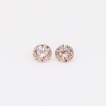 0.44 Total carat pair of intense pink champagne diamonds