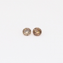0.1 Total carat pair of round-cut champagne diamonds