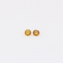 0.04 Total carat pair of round-cut fancy deep orange diamond