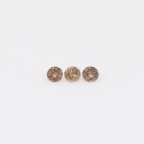 0.06 Total carat trio of round-cut champagne diamonds