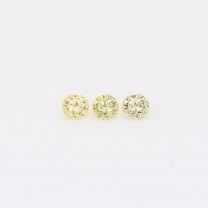 0.12 Total carat trio of round-cut fancy yellow diamonds