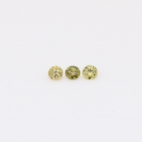 0.06 Total carat pair of round-cut fancy green diamonds