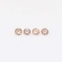 0.12 Total carat pair of intense pink champagne diamonds
