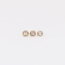 0.03 Total carat trio of champagne diamonds