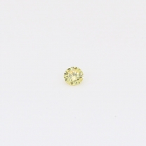 0.045 Carat round-cut fancy yellow diamond