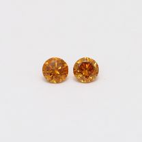0.20 Total carat pair of orange diamonds