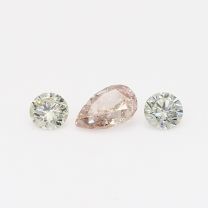 0.54 Total carat trio of pear and oval cut green and orangey pink diamonds