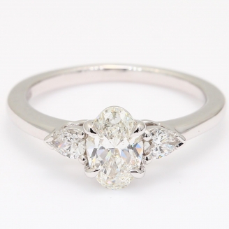 Cortina oval and pear-cut white diamond three-stone engagement ring