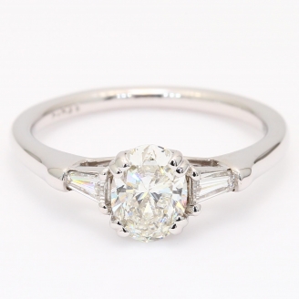 Daria oval and tapered baguette-cut white diamond three-stone engagement ring