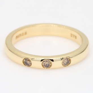 Trilogy champagne diamond three-stone ring