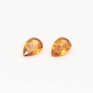 0.40 Total carat pair of pear-cut fancy intense orange diamonds