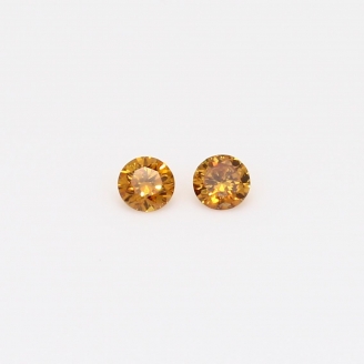 0.16 Total carat pair of round-cut fancy orange diamonds