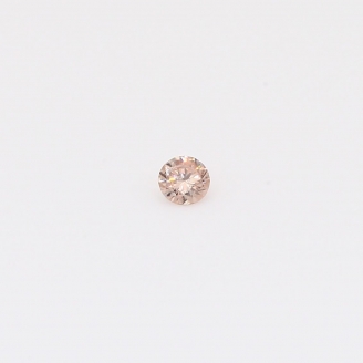 0.05 Carat round-cut intense pink champagne diamond
