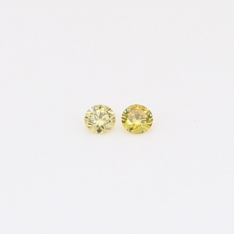 0.08 Total carat pair of round-cut fancy yellow diamonds